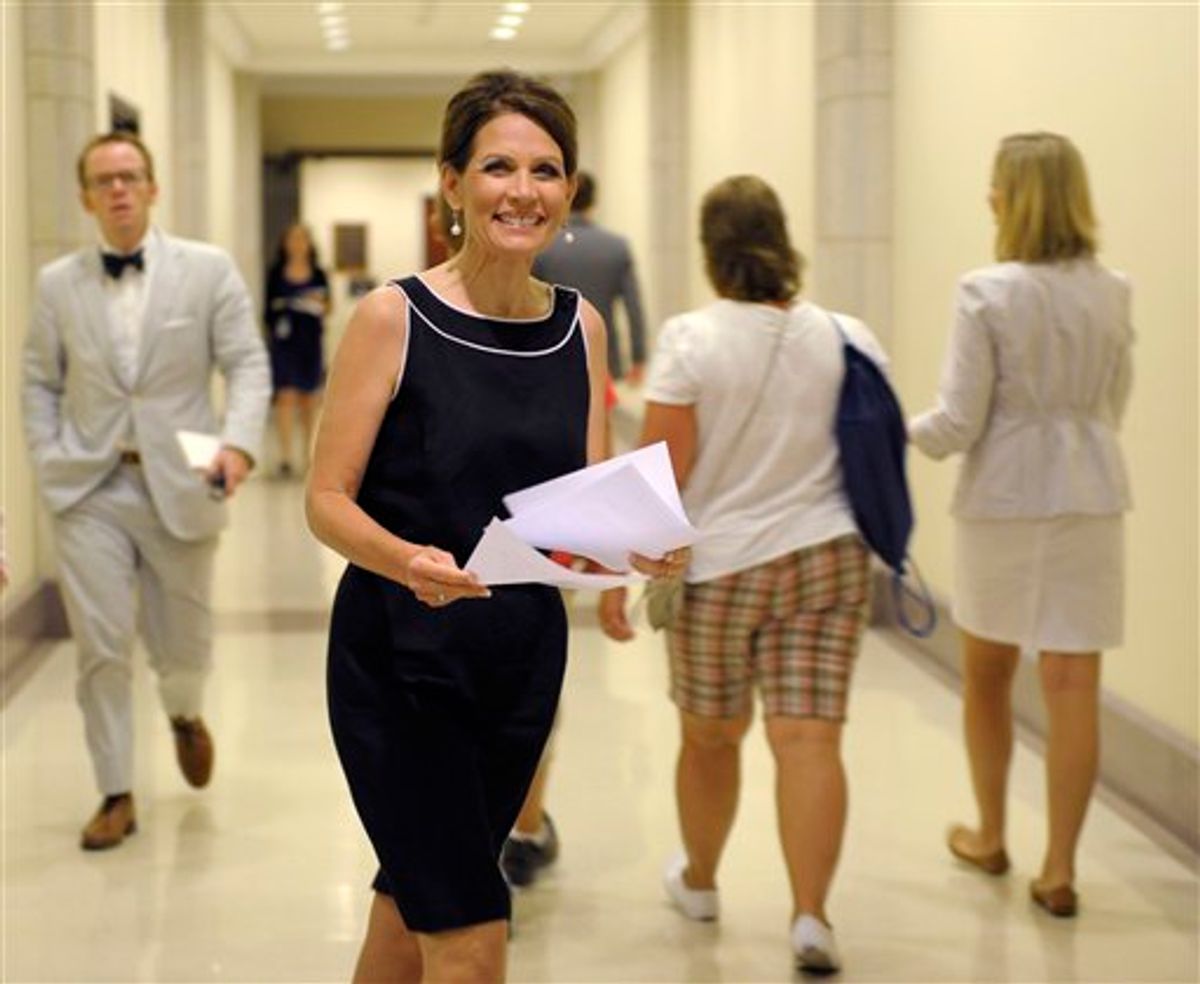 Republican presidential candidate, Rep. Michele Bachmann, R-Minn. heads to a news conference on Capitol Hill in Washington, Wednesday, July 13, 2011. (AP Photo/Susan Walsh)   (AP)