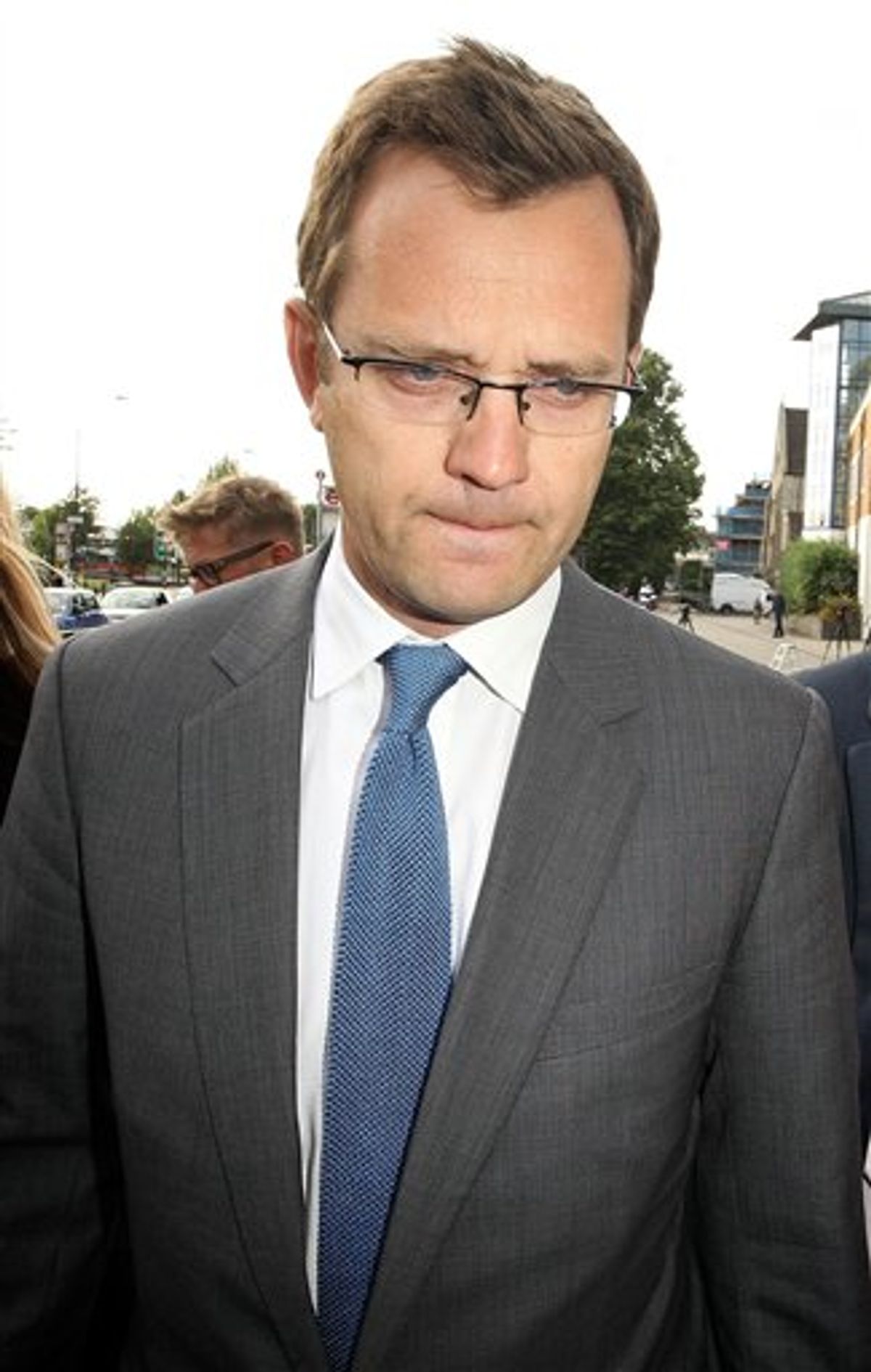 July 8 2011 photo  of former Downing Street communications chief and  previously News of the World tabloid editor Andy Coulson who avoided the top-level security checks by Government investigators that his predecessors endured, it has been claimed Thursday July 21, 2011. Britain's Prime Minister David Cameron admitted Wednesday that his former media strategist, now arrested under suspicion of phone hacking while at the paper, had only a basic level of vetting, which meant he was not cleared to view the most secret Government files unlike his predecessors under former Prime Ministers.  Opposition lawmakers ask if he was vetted at a less stringent level to avoid information about his past coming to light. (AP Photo/ Dominic Lipinski / PA ) UNITED KINGDOM OUT - NO SALES - NO ARCHIVES (AP)