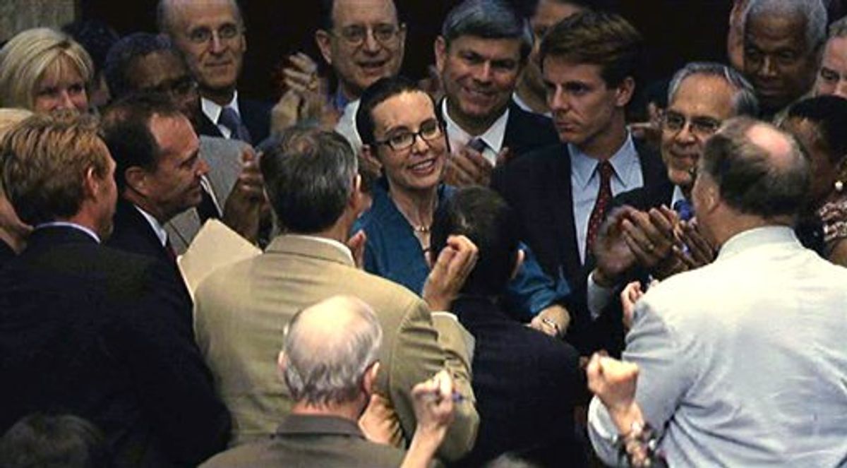 In this image from House Television, Rep. Gabrielle Giffords, D-Ariz., center, appears on the floor of the House of Representatives Monday, Aug. 1, 2011, in Washington. Giffords was on the floor for the first time since her shooting earlier this year, attending a vote on the debt standoff compromise. (AP Photo/House Television)  (AP)