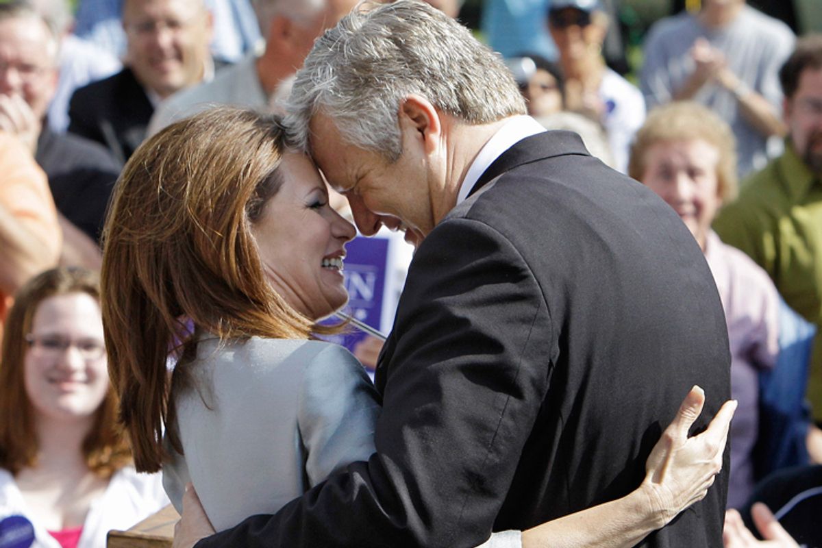 Rep. Michele Bachmann, R-Minn., gets a hug from her husband Marcus following her formal announcement to seek the 2012 Republican presidential nomination, Monday, June 27, 2011, in Waterloo, Iowa.     