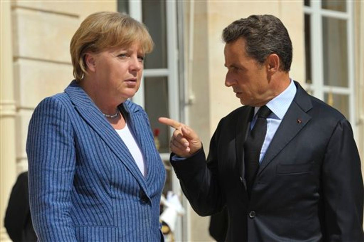 France's President Nicolas Sarkozy, right, points his finger as he speaks with  German Chancellor Angela Merkel as he welcomed the German leader at the Elysee Palace, in Paris Tuesday Aug. 16, 2011. (AP Photo/Philippe Wojazer, Pool)    (AP)