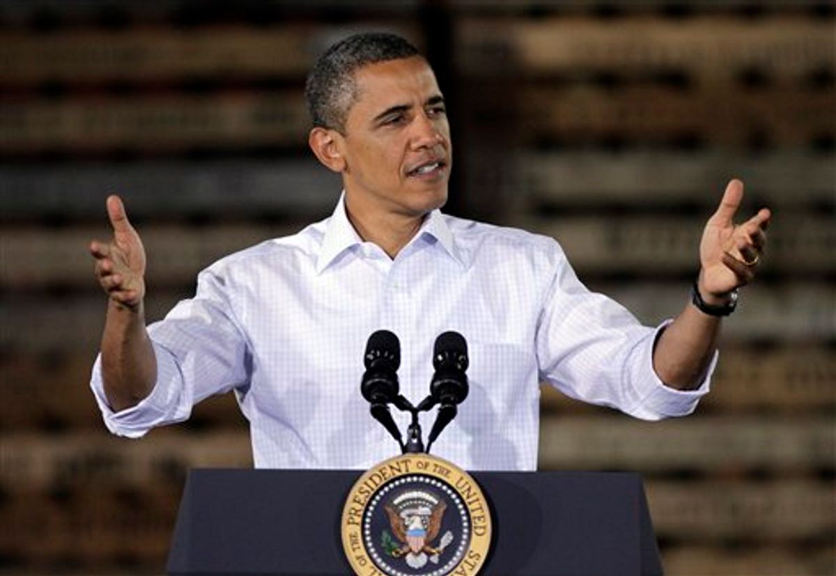 President Barack Obama speaks during a town hall meeting at Wyffels Hybrids Inc., seed company, Wednesday, Aug. 17, 2011, in Atkinson, Ill. (AP Photo/Charlie Neibergall) (AP)