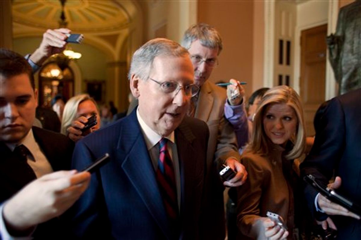 Senate Minority Leader Mitch McConnell, R-Ky., returns to his office following a vote as the debt crisis continues on Capitol Hill in Washington Sunday, July 31, 2011. (AP Photo/Harry Hamburg)  (AP)