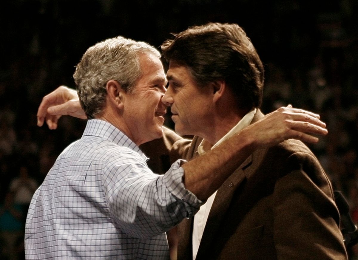 U.S. President George W. Bush (L) embraces Texas governor Rick Perry at a Republican Party election campaign rally in Dallas November 6, 2006. Bush is campaigning for Republican party Congressional candidates in Florida, Arkansas and Texas on the eve of the mid-term elections to be held November 7.    REUTERS/Jason Reed   (UNITED STATES) (Â© Jason Reed / Reuters)