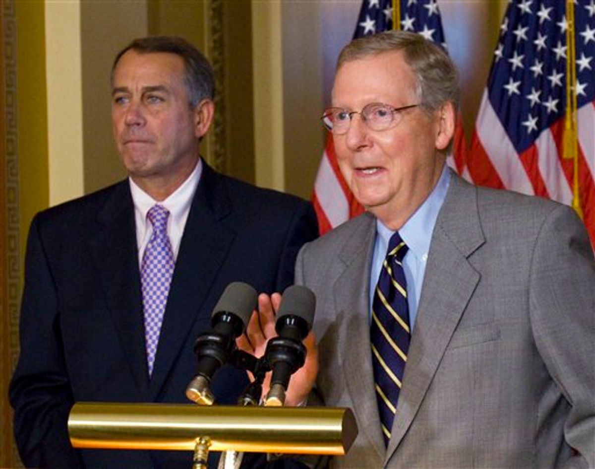 House Speaker John Boehner, R-Ohio, and Senate Minority Leader Mitch McConnell, R-Ky., speak at a news conference on Capitol Hill in Washington, Saturday, July 30, 2011.(AP Photo/Harry Hamburg) (AP)