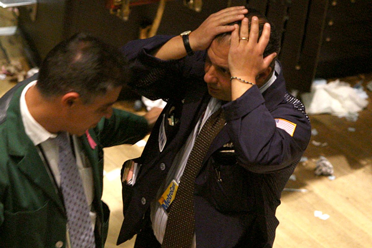 Traders work on the floor of the New York Stock Exchange, October 15, 2008.  