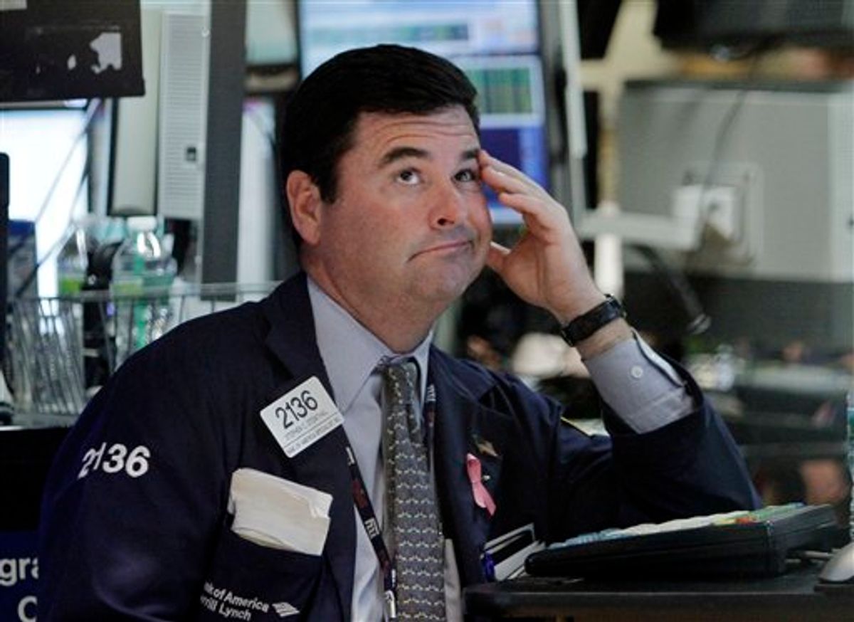 Specialist Stephen Steinthal works at his post on the floor of the New York Stock Exchange Wednesday, Aug. 10, 2011. (AP Photo/Richard Drew) (AP)