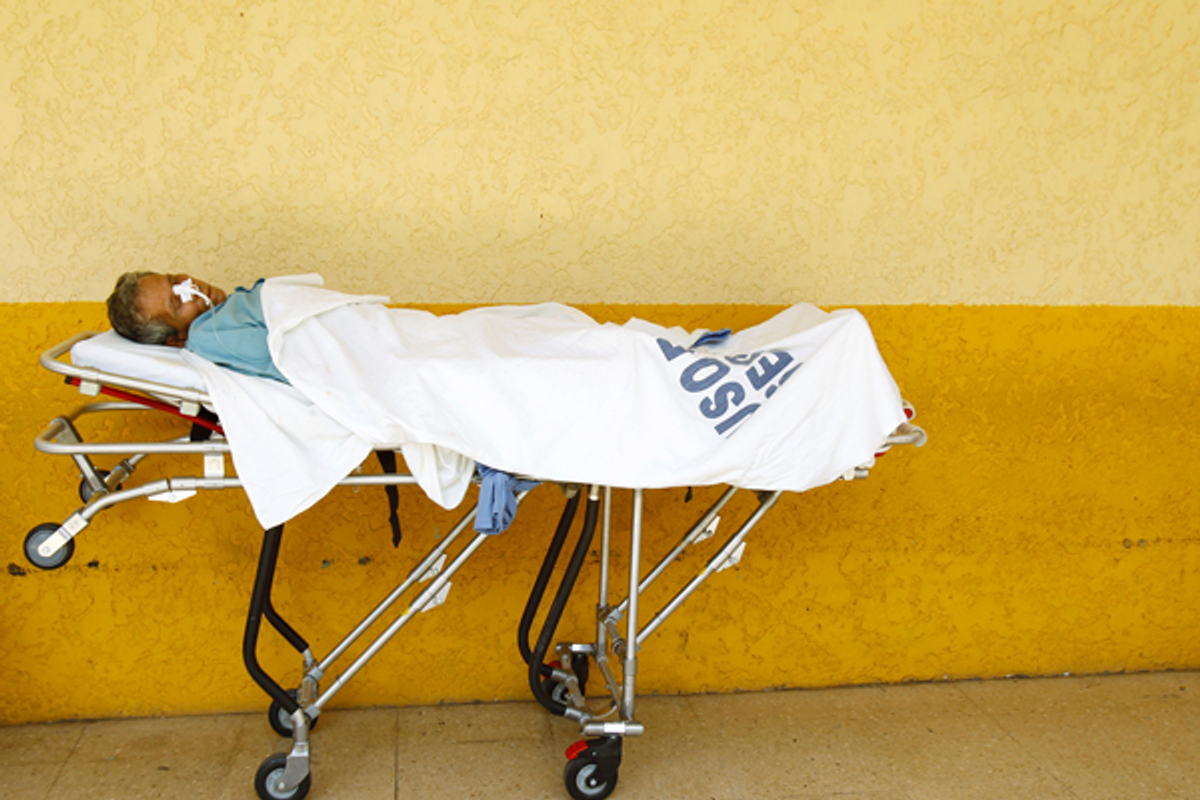 A Costa Rican patient awaits care in a San Jose hospital on July 20, 2011         