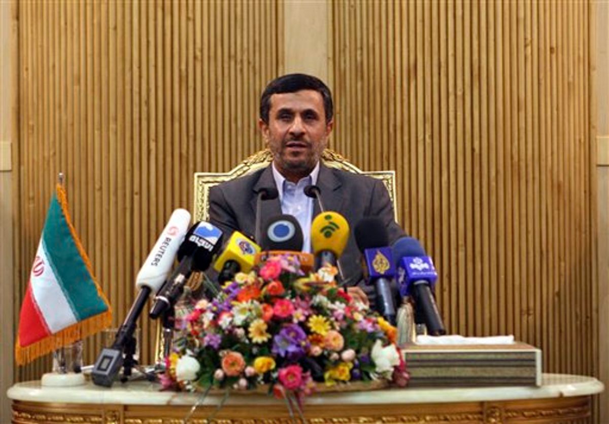 Iranian President Mahmoud Ahmadinejad briefs the media, prior to departing Tehran's Mehrabad airport for a trip to Tajikistan, Sunday, Sept. 4, 2011. (AP Photo/Vahid Salemi) (AP)