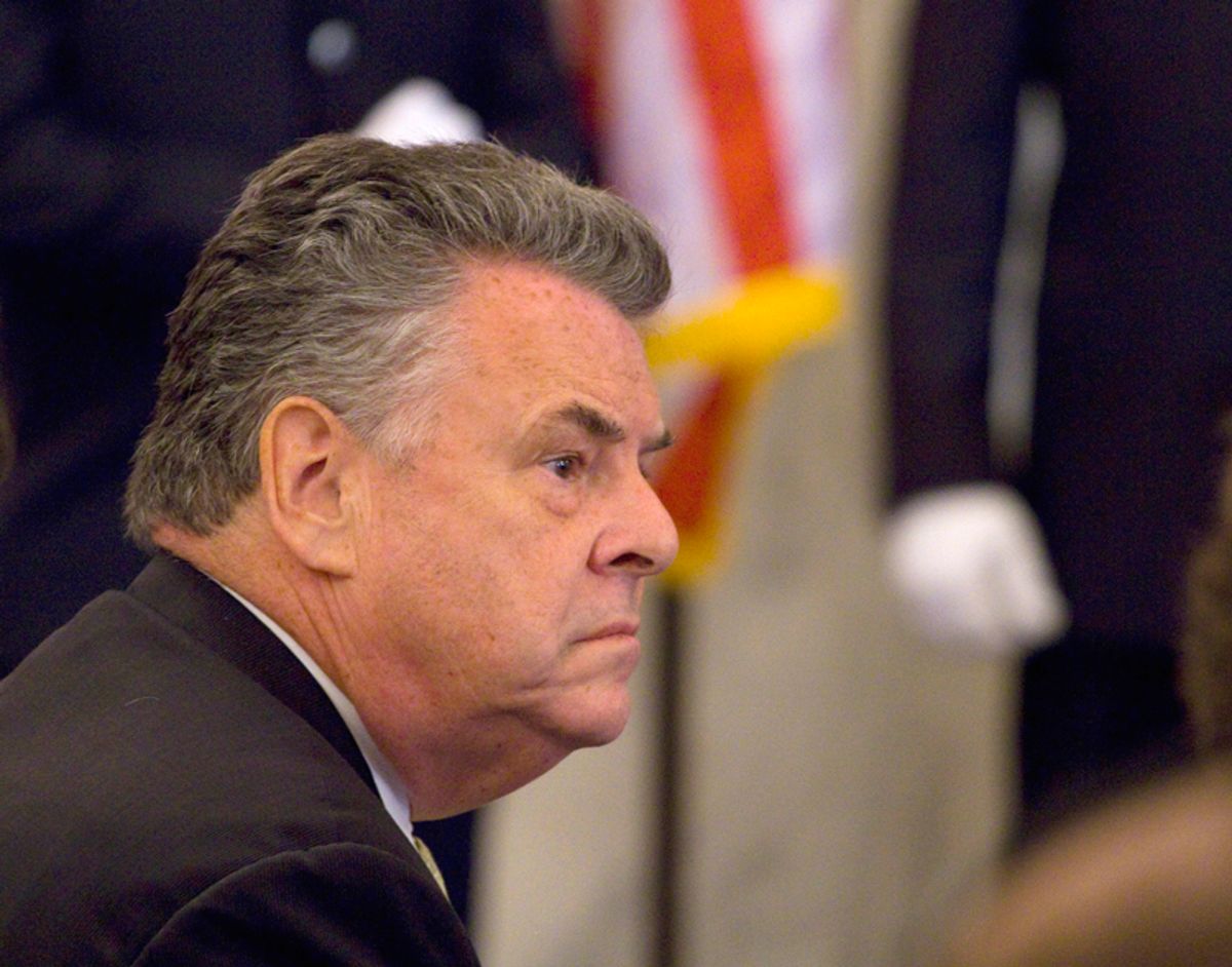 Rep. Peter King, R-N.Y. takes part in a ceremony on Capitol Hill in Washington, Thursday, July 14, 2011, to stitch the National 9/11 flag. (AP Photo/Harry Hamburg) (Harry Hamburg)