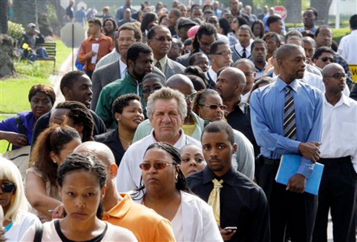 Crowds of job-seekers wait to enter a job fair at Crenshaw Christian Center in South Los Angeles, Wednesday, Aug. 31, 2011. Fewer people applied for unemployment benefits last week, a sign layoffs have stabilized. (AP Photo/Reed Saxon)   (AP)