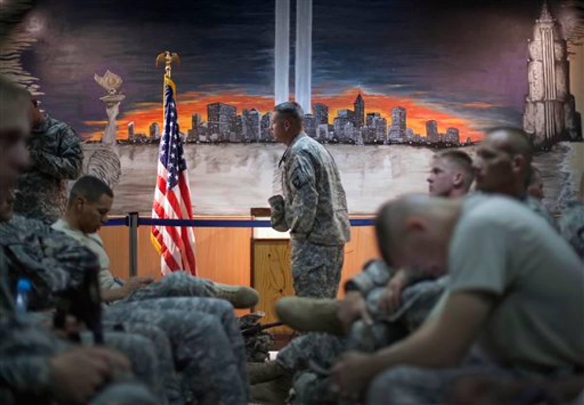 U.S. soldiers await a flight home in Manas, Kyrgyzstan, after a year's deployment in Afghanistan