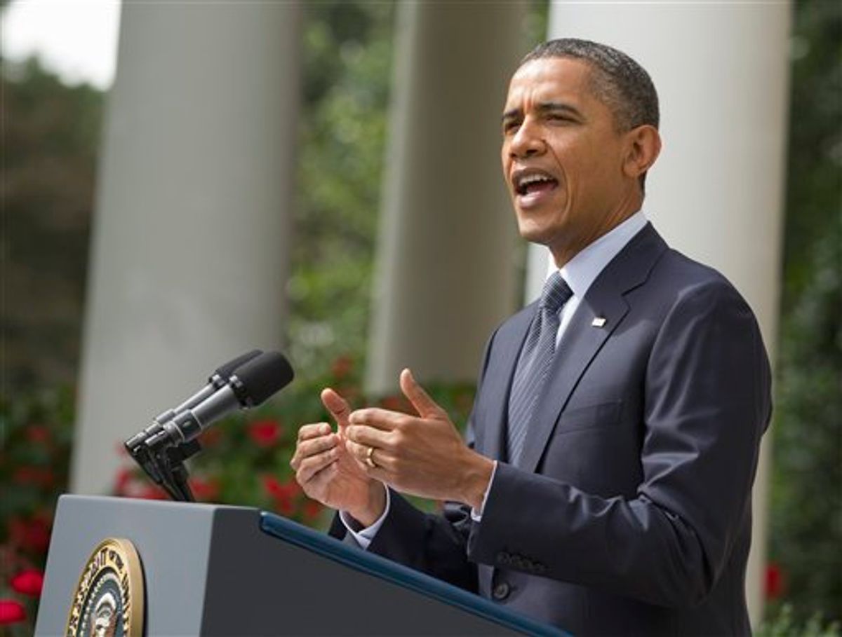 President Barack Obama gestures while speaking in the Rose Garden of the White House in Washington, Monday, Sept. 19, 2011.    (AP Photo/Evan Vucci) (AP)