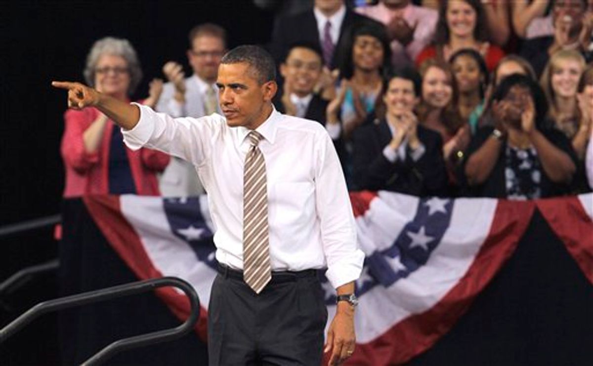 President Barack Obama points to the crowd following his speech at North Carolina State University in Raleigh, N.C., Wednesday, Sept. 14, 2011, where he spoke about the American Jobs Act. (AP Photo/Gerry Broome) (AP)