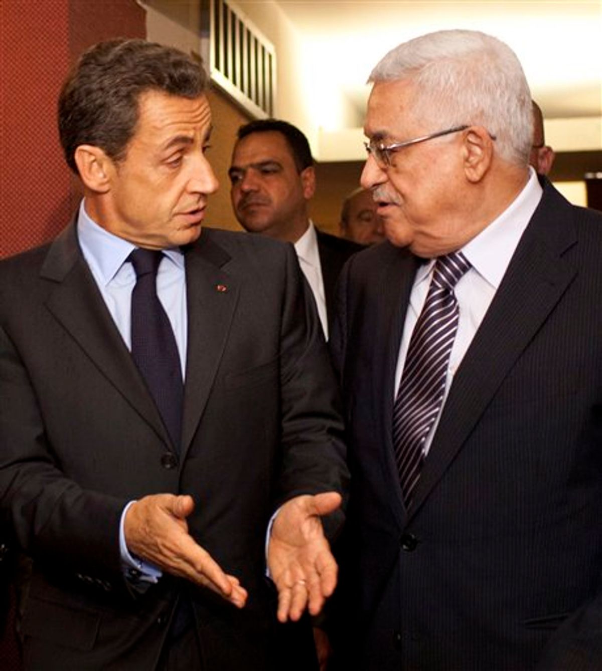 French President Nicolas Sarkozy, left, meets with Palestinian President Mahmoud Abbas at the Millennium Hotel in New York during the 66th session of the United Nations General Assembly on Tuesday, Sept. 20, 2011. (AP Photo/Andrew Burton) (AP)