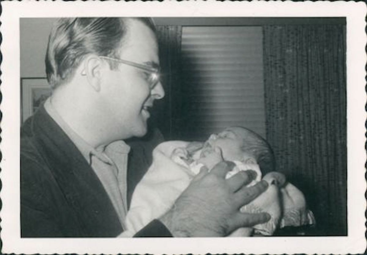 The author's father holding the author as a baby (Courtesy of Pat MacEnulty)