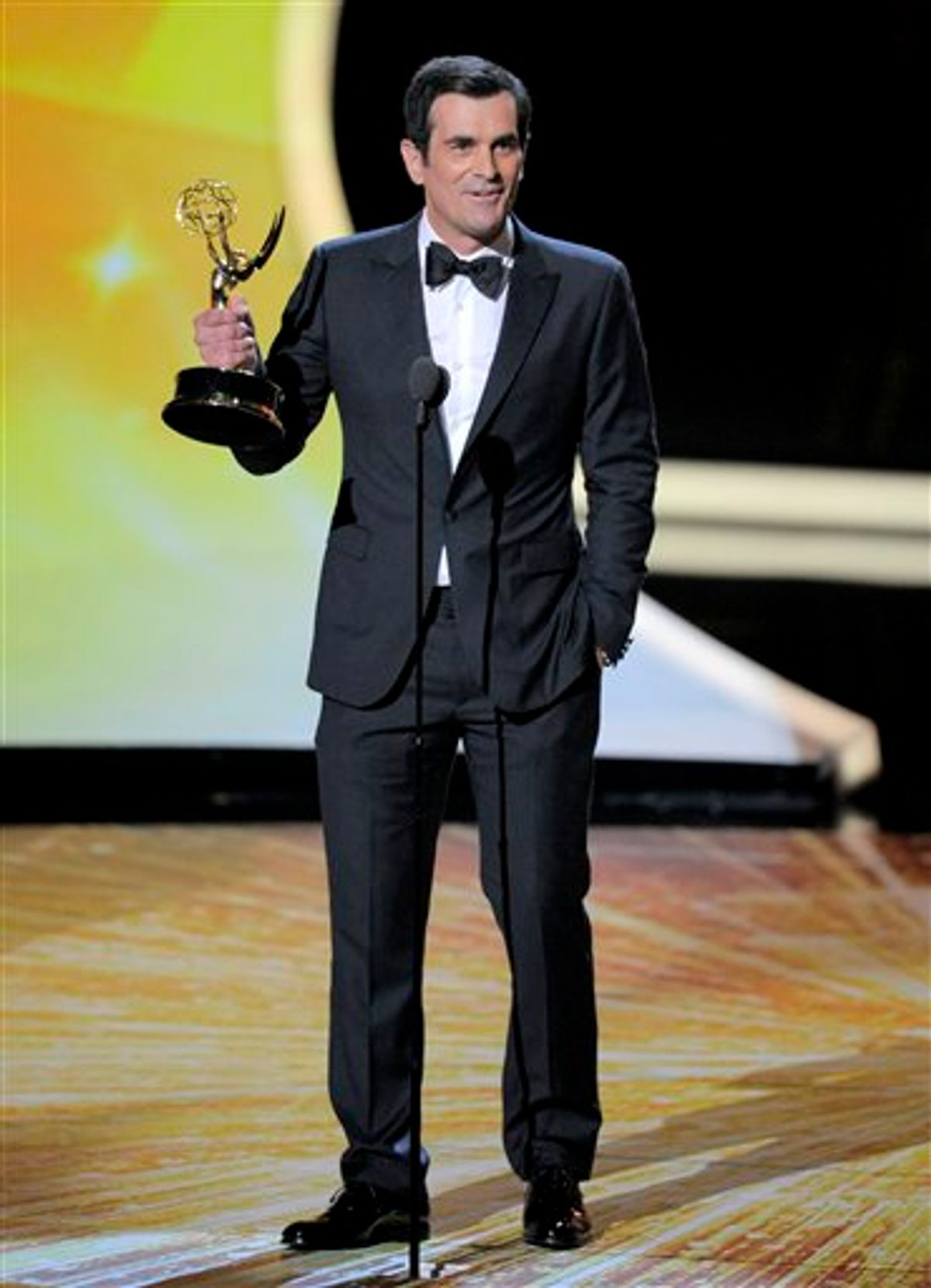Ty Burrell accepts the award for outstanding supporting actor in a comedy series for Modern Family at the 63rd Primetime Emmy Awards on Sunday, Sept. 18, 2011 in Los Angeles. (AP Photo/Mark J. Terrill) (AP)