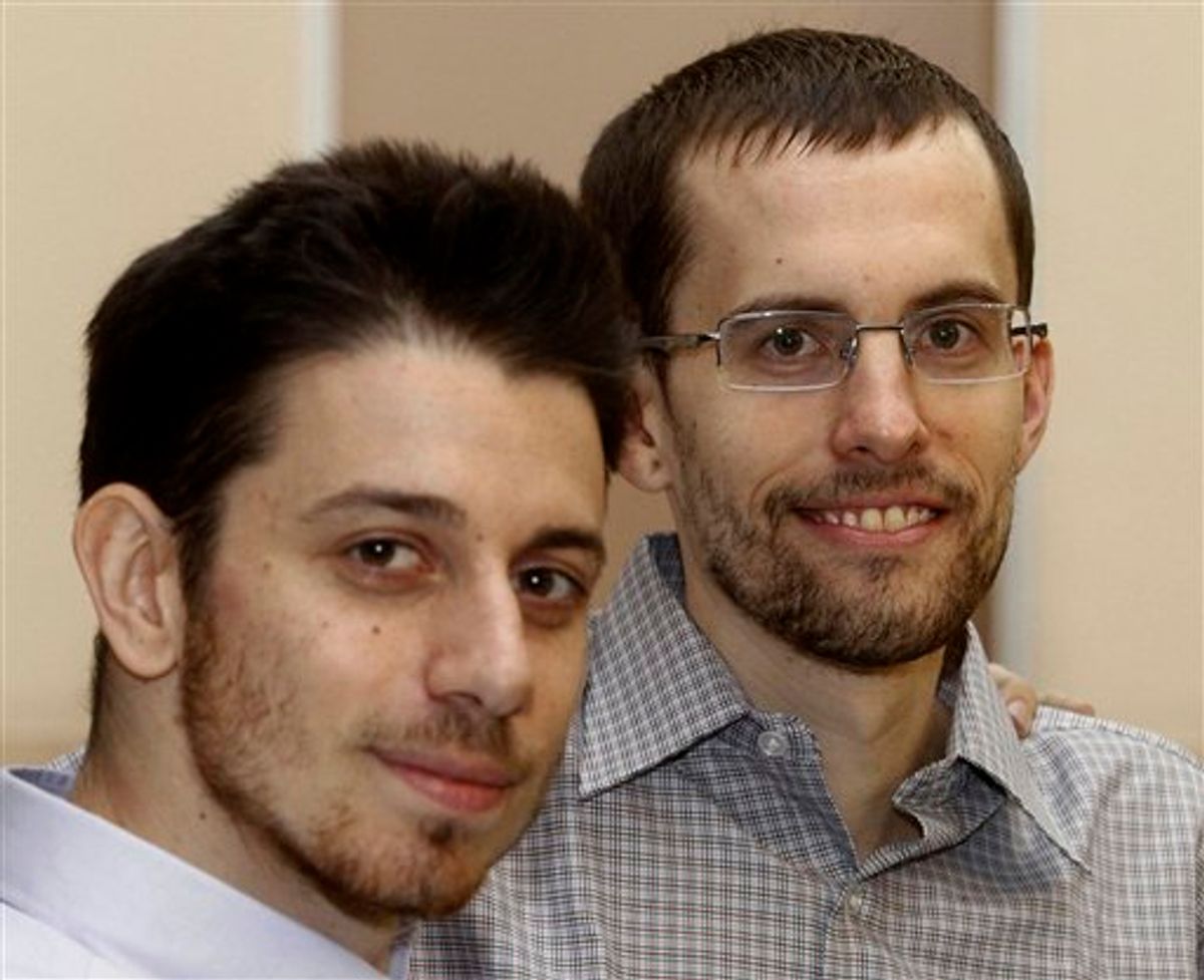 In this photo released by the Islamic Republic News Agency, IRNA, on Wednesday, Sept. 21, 2011, US hikers Shane Bauer, right, and Josh Fattal, smile, at the Tehran's Mehrabad airport before leaving Iran. Two Americans jailed in Iran as spies left Tehran on Wednesday, closing a high-profile drama with archfoe Washington that brought more than two years of hope then heartbreak for the families as the Islamic Republic's hard-line rulers rejected international calls for their release. (AP Photo/IRNA, Ehsan Nederipour) (AP Photo/IRNA, Ehsan Nederipour)