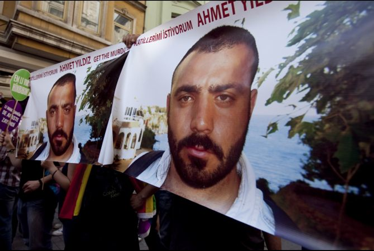  Demonstrators tried to raise awareness of the 2008 murder of Ahmet Yildiz ("Get the Murderers" is written above the victim's photo) during a gay pride march in Istanbul on June 26, 2011  (Jodi Hilton/GlobalPost)