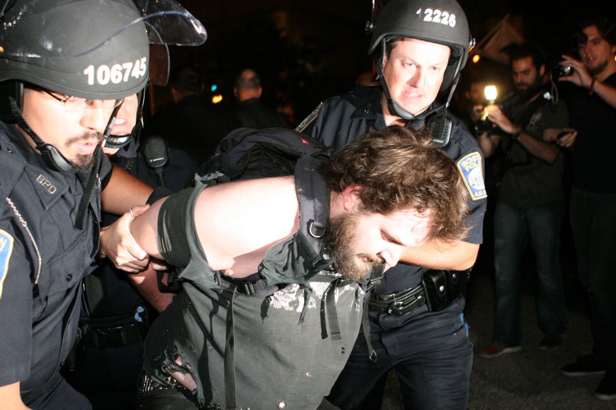 Boston Police arrest a demonstrator on Oct. 10, 2011.    (<span about='http://www.flickr.com/photos/31167233@N08/6234070462/' xmlns:cc='http://creativecommons.org/ns#'><a href='http://www.flickr.com/photos/31167233@N08/6234070462/' rel='cc:attributionURL' target='_blank'>Paul Weiskel</a> / <a href='http://creativecommons.org/licenses/by/3.0/' rel='license' target='_blank'>CC BY 3.0</a></span>)