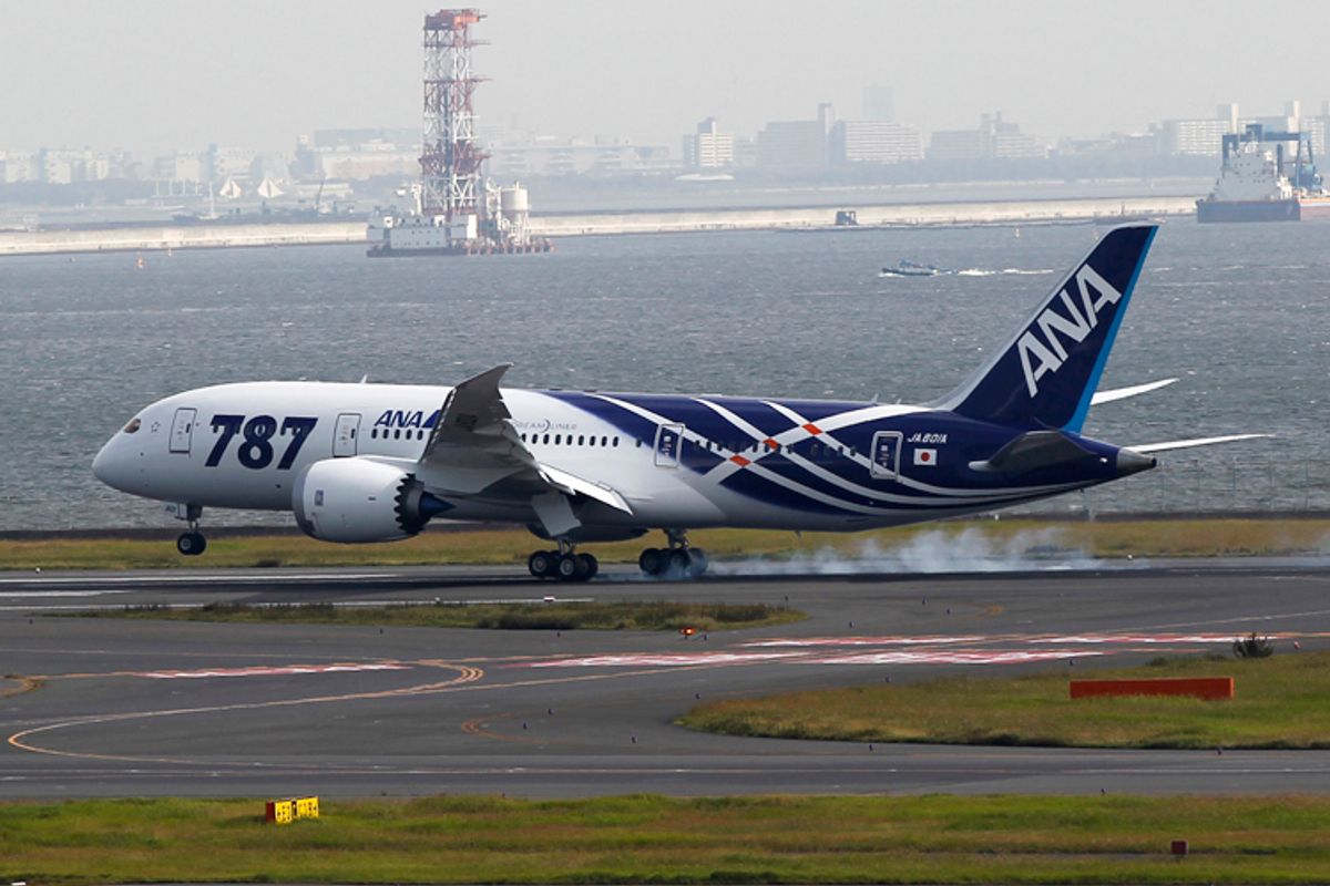 A Boeing 787 Dreamliner aircraft lands for delivery to All Nippon Airways (ANA) of Japan at Haneda airport in Tokyo September 28, 2011.   (Toru Hanai / Reuters)