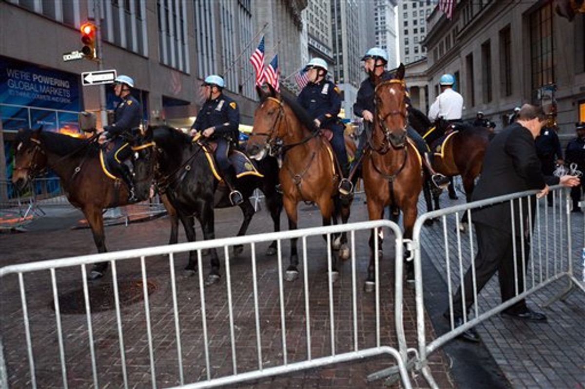 Mounted police officers near Zuccotti Park in lower Manhattan.   (AP)