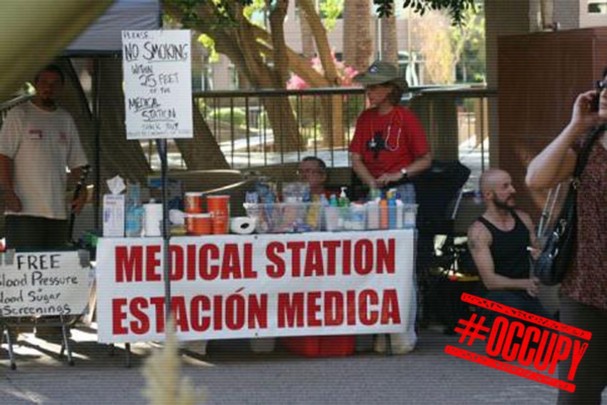The author with other volunteers at a free medical station at Occupy Phoenix       (Robert Haasch)