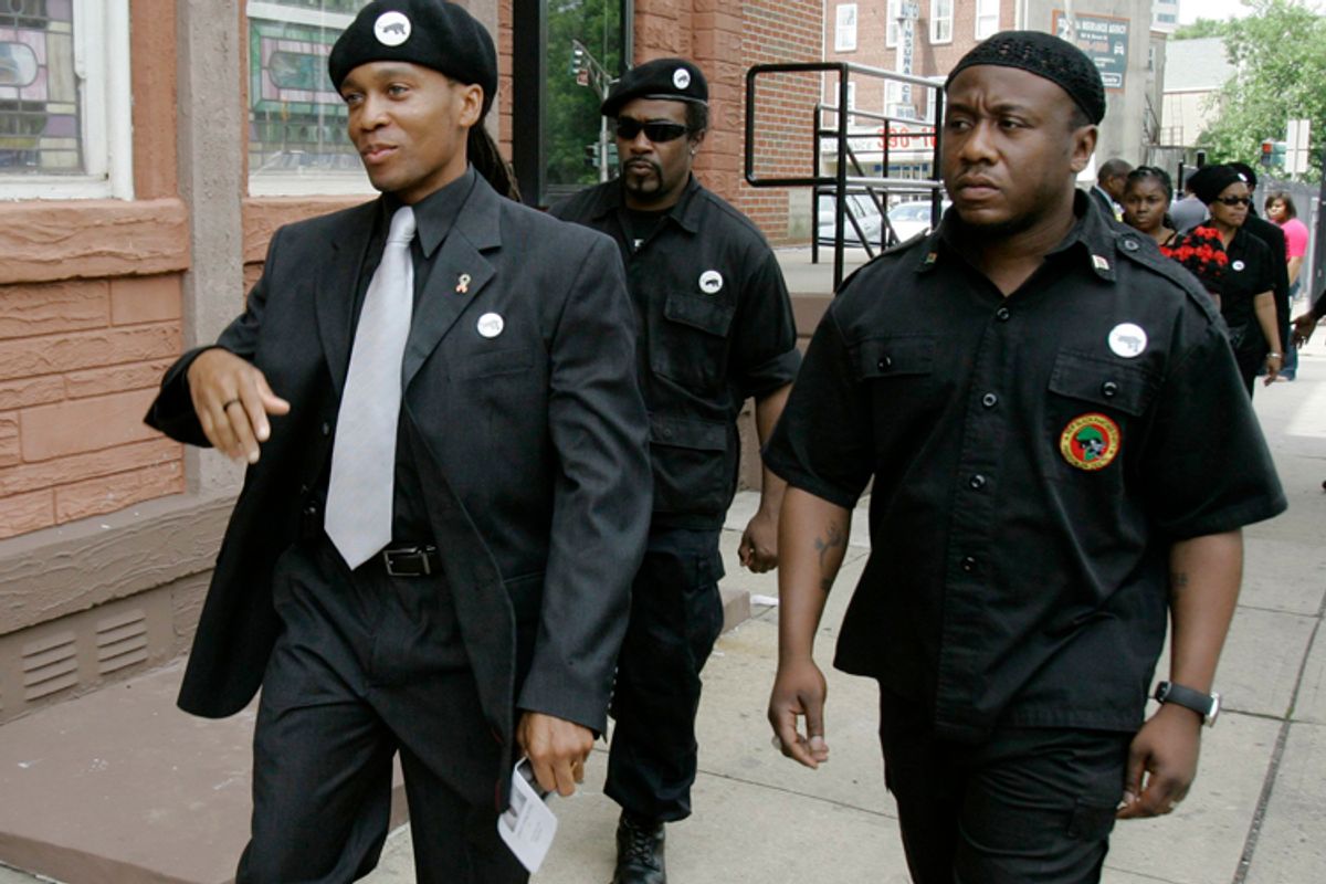 Members of the New Black Panther Party, including, Divine Allah, left, arrive for funeral services for 13-year-old shooting victim, Tamrah Leonard, at the Friendship Baptist Church in Trenton, N.J., Saturday, June 13, 2009.       (AP/Mike Derer)