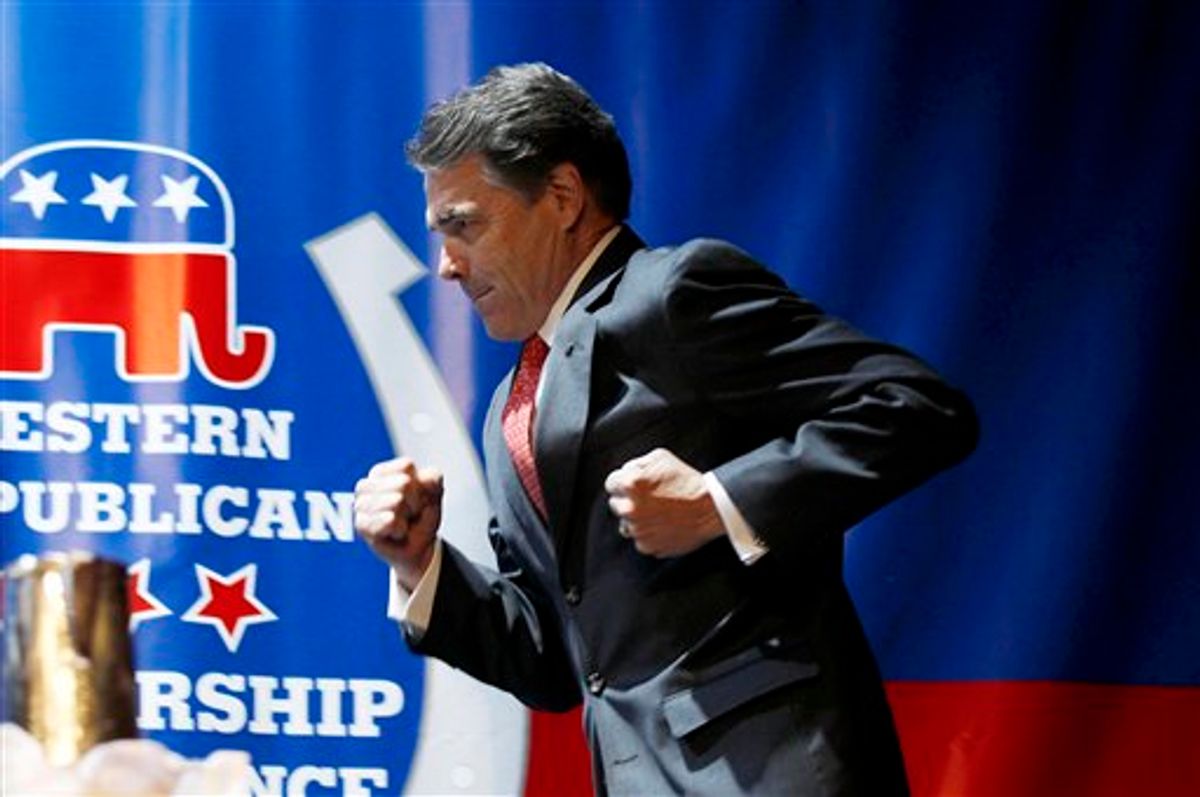 Republican presidential candidate, Texas Gov. Rick Perry, runs prior to delivering a keynote address during the Western Republican Leadership Conference, Wednesday, Oct. 19, 2011, in Las Vegas. (AP Photo/Isaac Brekken)   (AP)