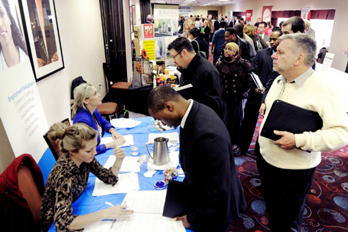 Job seekers attend the Minneapolis Career Fair held Wednesday, Nov. 2, 2011, in Bloomington, Minn.       (AP/Jim Mone)