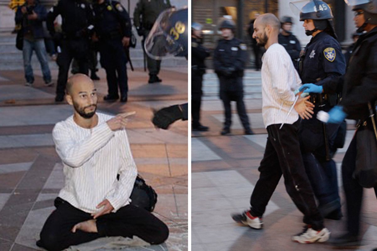 Police arrested Pancho Ramos Stierle as he was meditating at the Occupy Oakland encampment on Monday, Nov. 14, 2011.        (Ap/Paul Sakuma)
