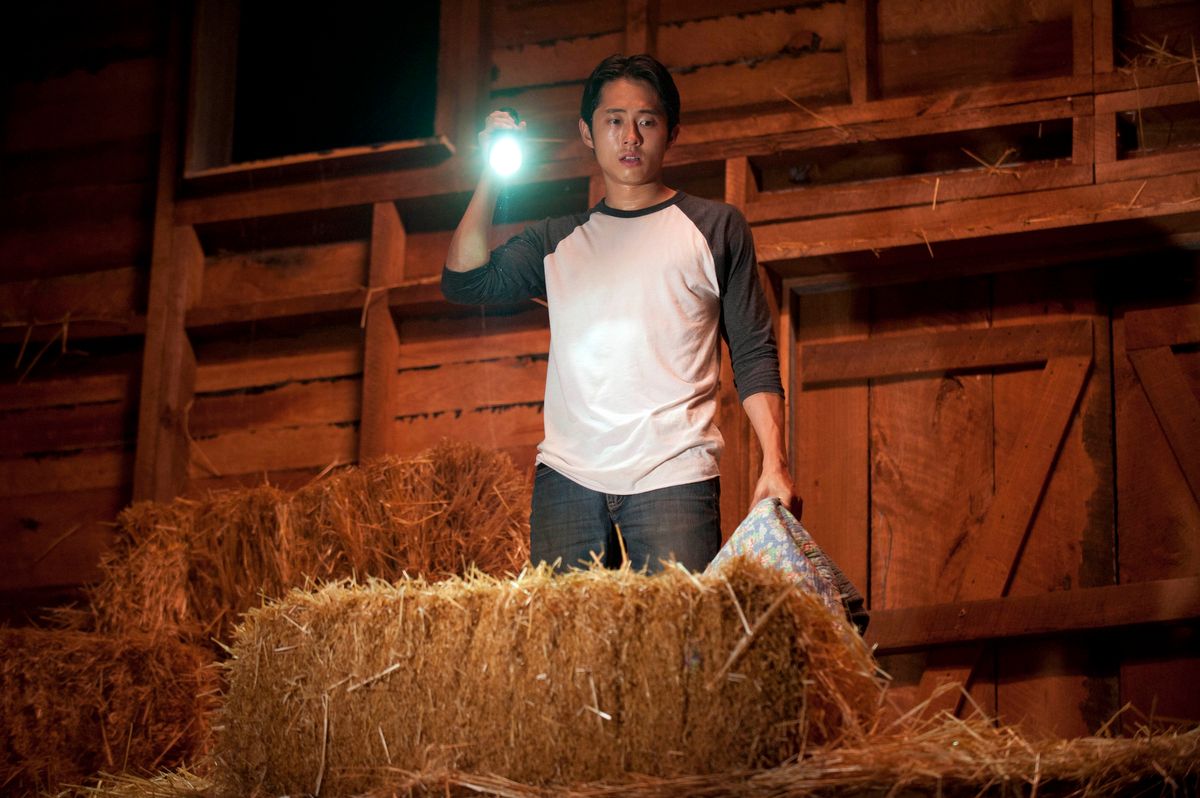 Glenn (Steven Yeun) makes a horrifying discovery in "The Walking Dead."        (Gene Page/AMC)