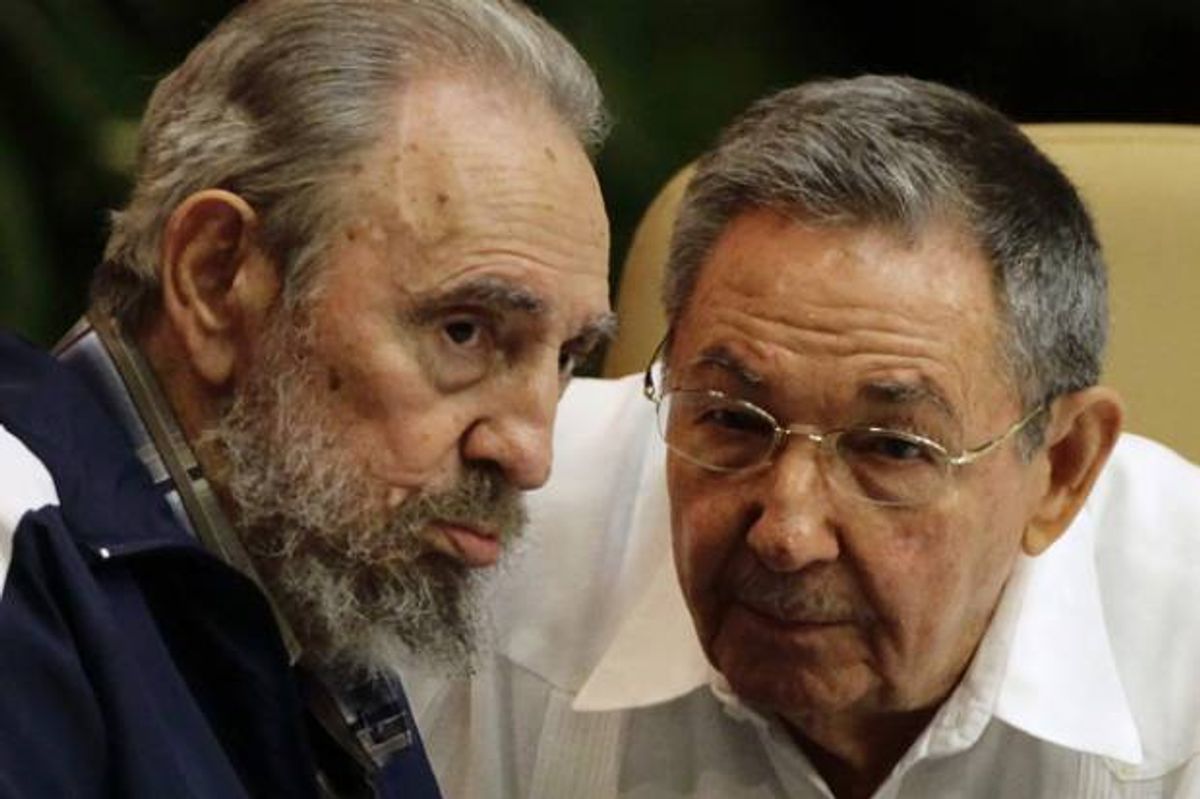 Former Cuban leader Fidel Castro and Cuba's President Raul Castro       (Desmond Boylan / Reuters)
