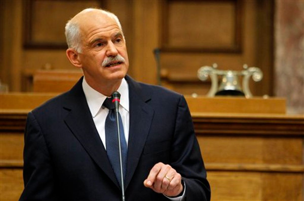 Greek Prime Minister George Papandreou addresses Socialist members of parliament in Athens, Monday, Oct. 31, 2011.      (AP/Thanassis Stavrakis)
