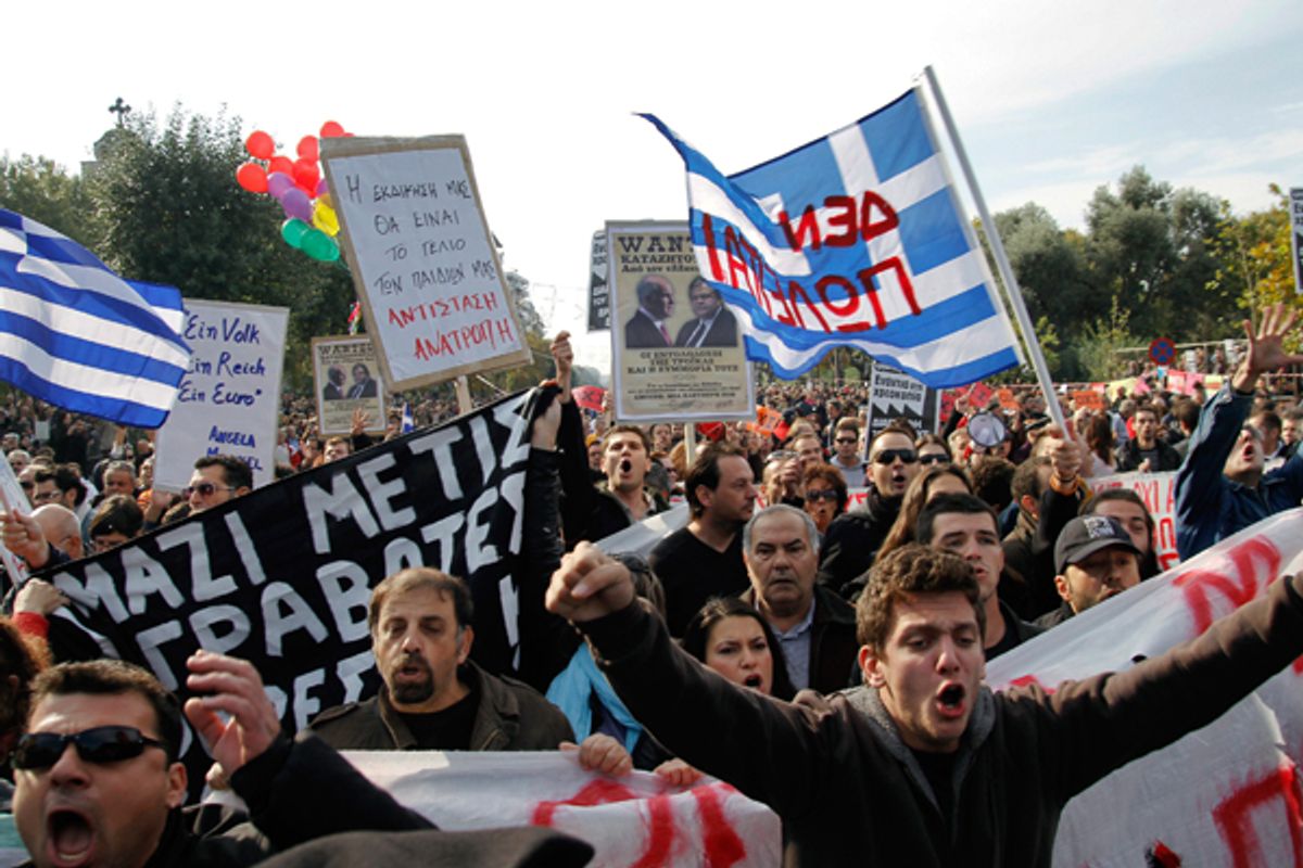 Protesters shout slogans as they protest against austerity policies in Greece.         (Reuters/Grigoris Siamidis)