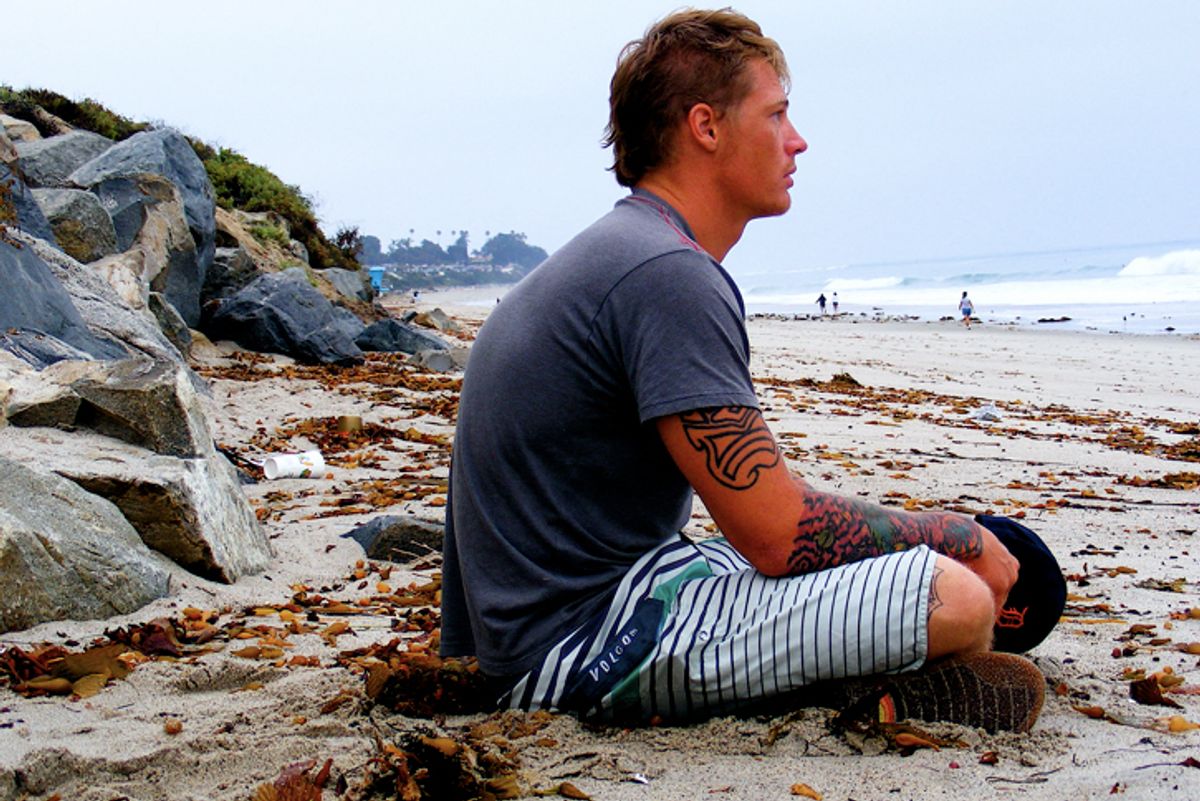 John Needham watches the waves at San Clemente State Beach.       (Michael de Yoanna)