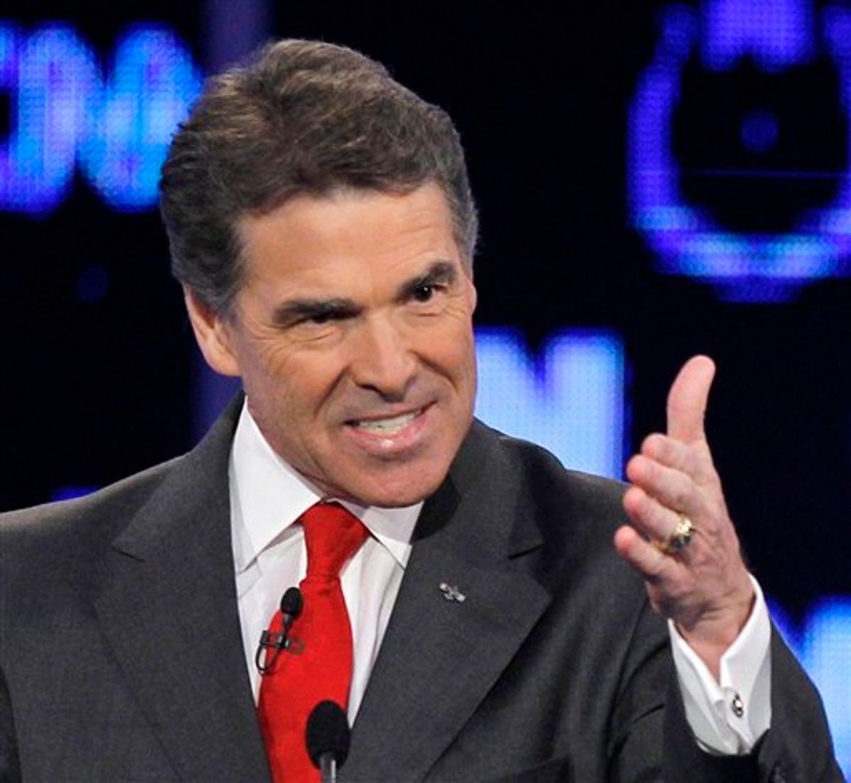 FILE - In this Oct. 18, 2011 file photo, Republican presidential candidate Texas Gov. Rick Perry makes a point during a Republican presidential debate in Las Vegas. (AP Photo/Chris Carlson, File)         (AP)