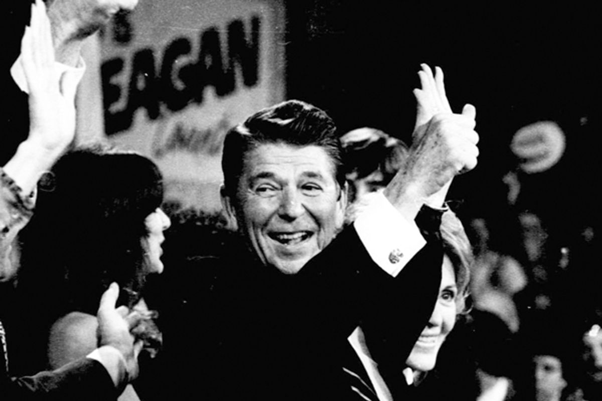 Ronald Reagan gives the thumbs-up sign as he leaves the podium after addressing supporters at his Los Angeles election headquarters on Nov. 5, 1980.  (AP)