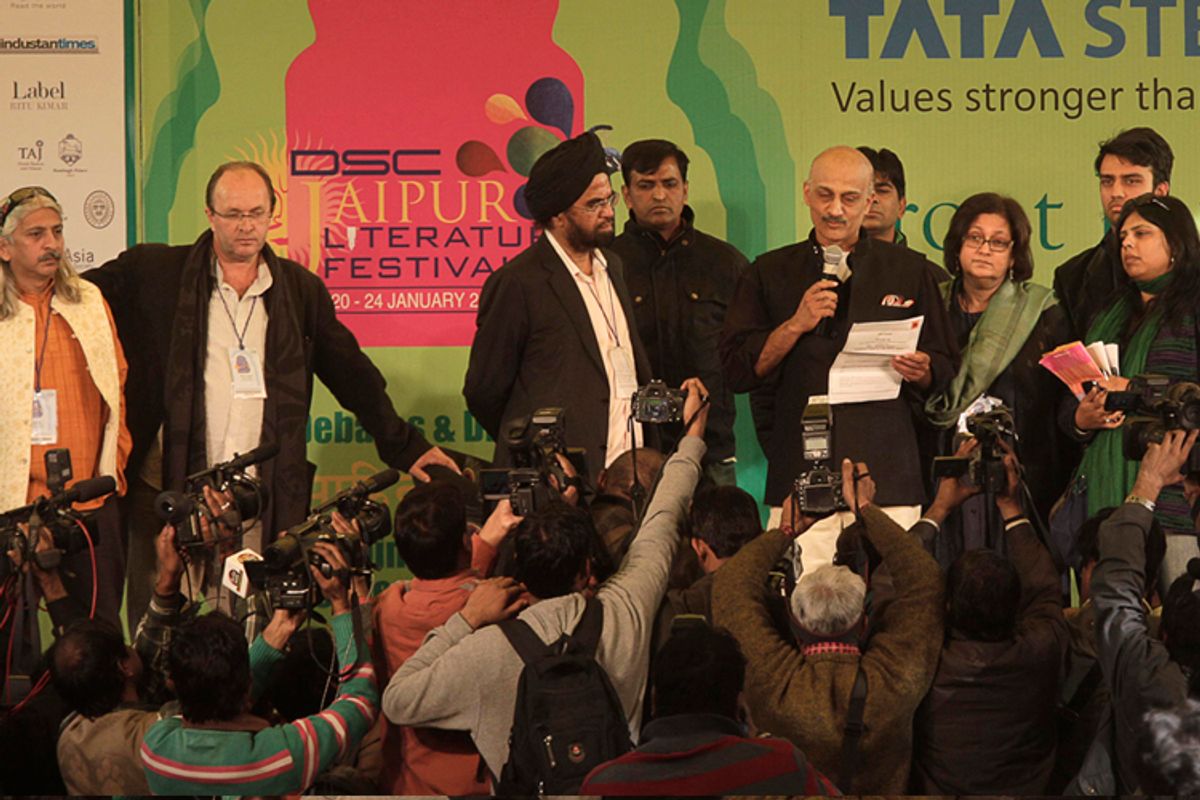 Officials announce the news of calling off Indian born British author Salman Rushdie's video conference at the Jaipur Literature Festival, in Jaipur, in the western Indian state of Rajasthan, Tuesday, Jan. 24, 2012.        (AP/Manish Swarup)
