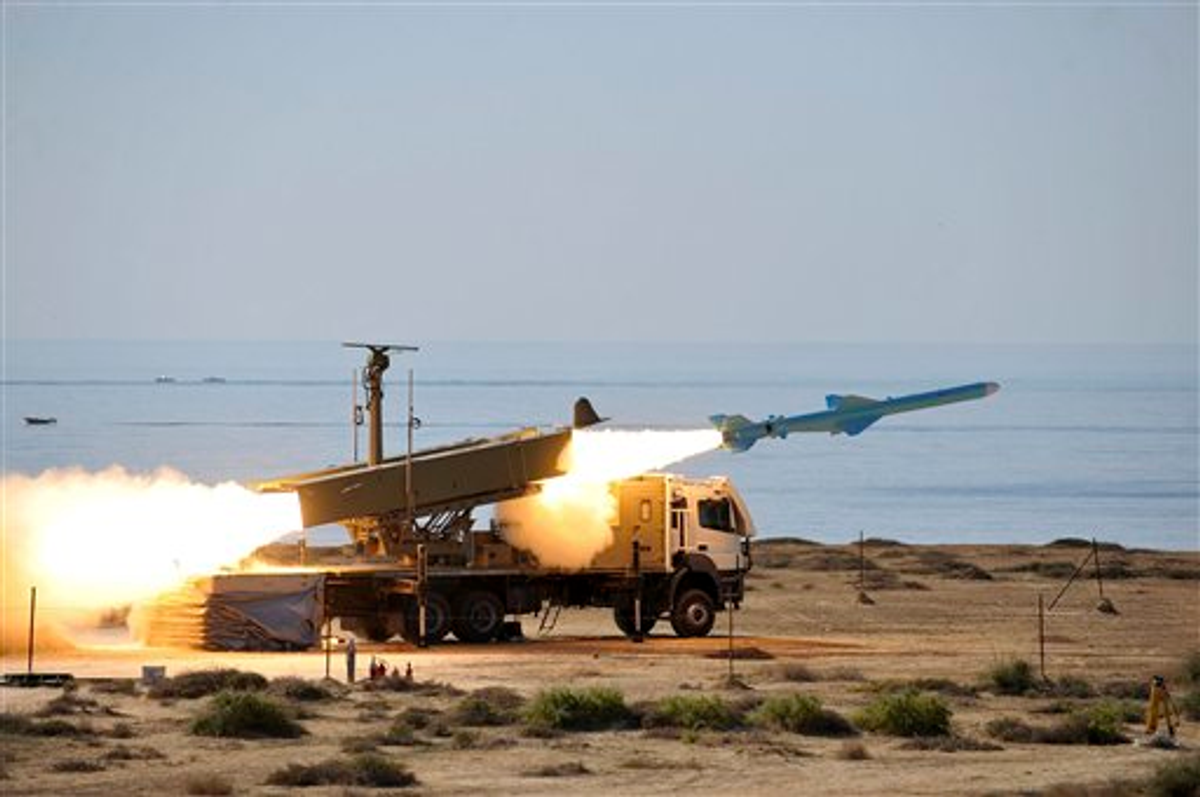 In this picture released by Iranian Students News Agency on Monday, Jan. 2, 2012, a missile is launched at the shore of sea of Oman during Iran's navy drill   (AP Photo/ISNA, Amir Kholousi)
