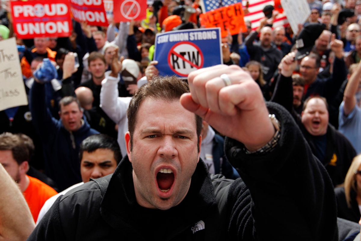 Protest greeted Indiana Senate's approval of right-to-work bill this week.        (AP/Michael Conroy)