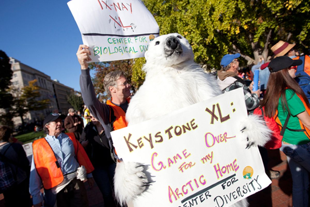 Protestors outside the White House demand a stop to the Keystone XL tar sands oil pipeline.       (AP/Evan Vucci)
