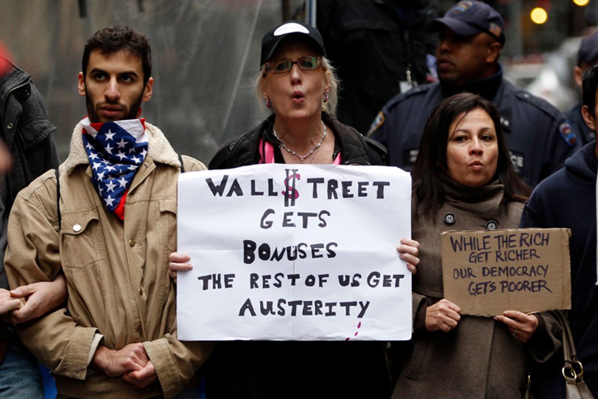 Occupy Wall street demonstrators near the New York Stock Exchange during what organizers called a "Day of Action" in New York, November 17, 2011.      (Mike Segar / Reuters)