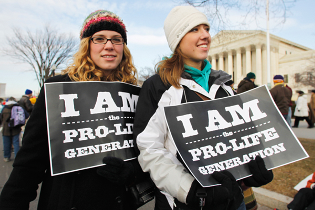 Anti-abortion activists march in front of the Supreme Court in Washington, Monday, Jan. 24, 2011       (AP/Manuel Balce Ceneta)