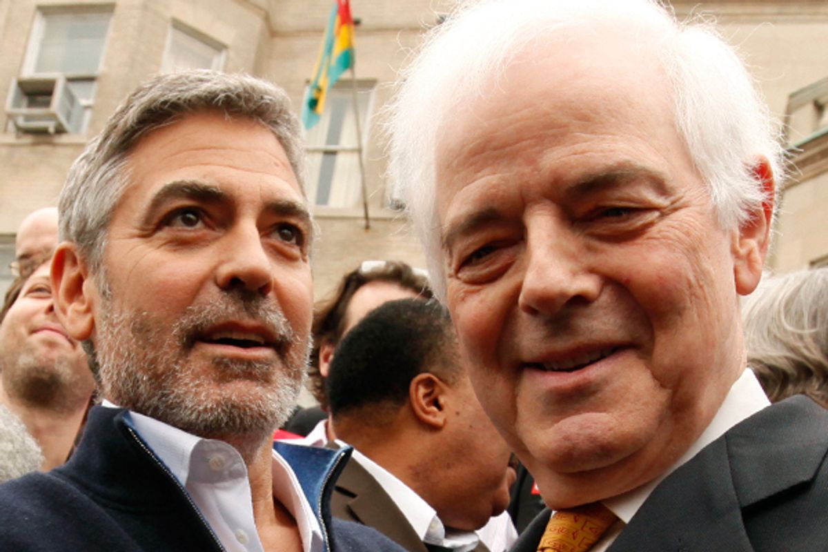 George and Nick Clooney  on the steps of the Sudan Embassy in Washington, D.C., on March 16.    (Reuters/Kevin Lamarque)
