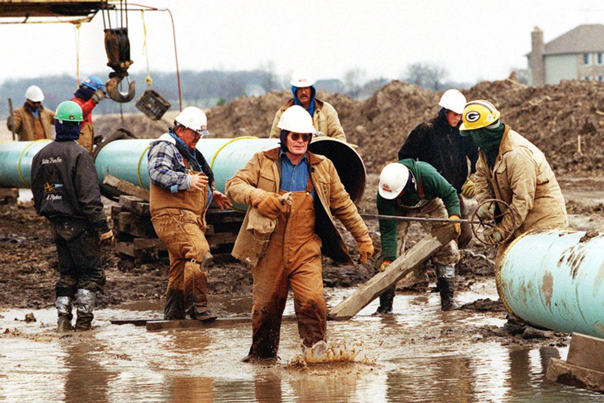 Members of the "chain gang" assemble a pipeline near Burlington, Ill.             (AP)
