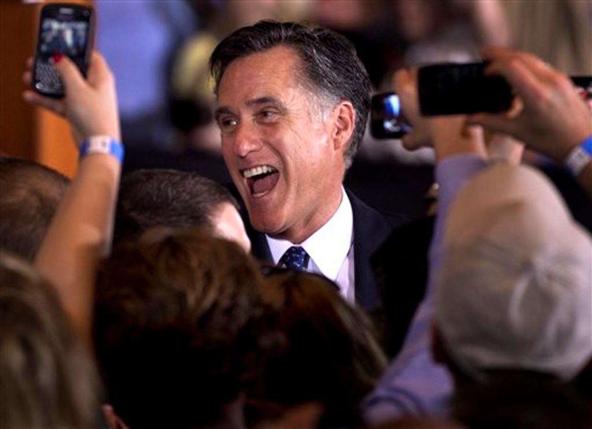 Republican presidential candidate, former Massachusetts Gov. Mitt Romney reacts while greeting supporters at a rally in Schaumburg, Ill., after the winning the Illinois Republican presidential primary, Tuesday, March 20, 2012.  (AP Photo/Steven Senne)     (AP)