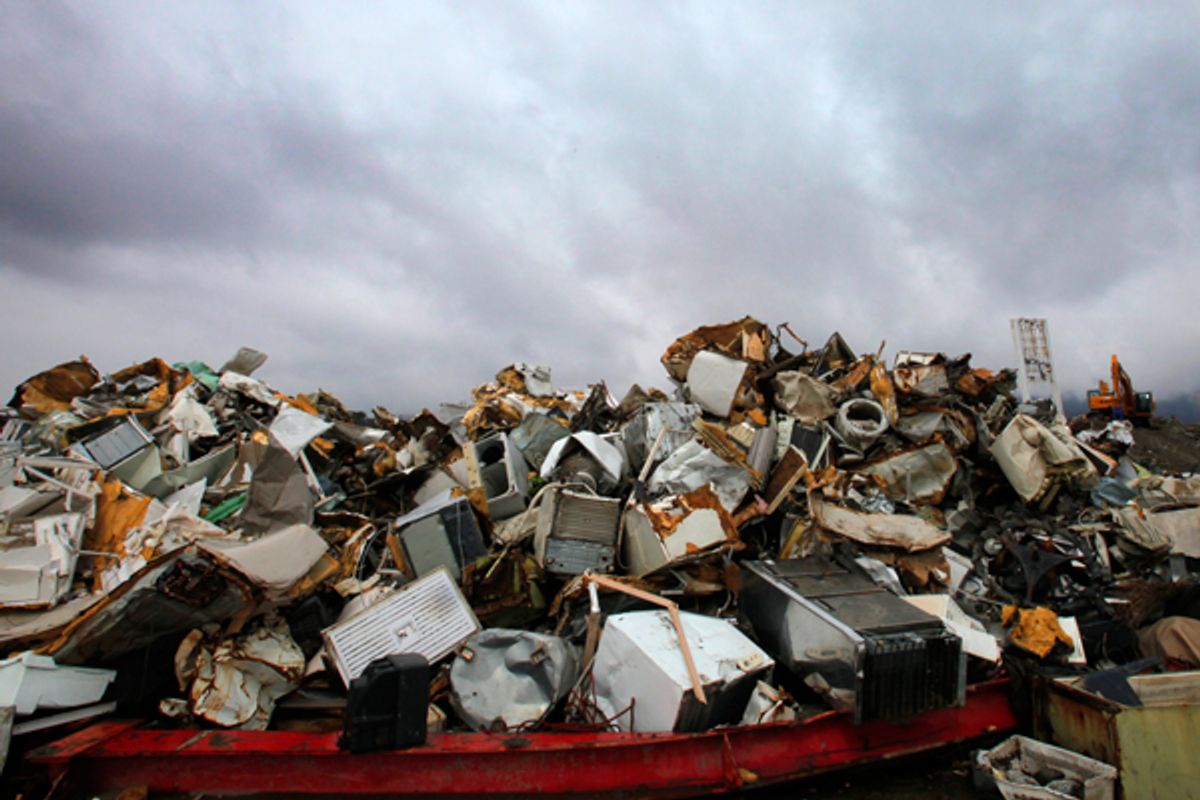 Debris left by the 2011 tsunami is piled up in Ofunato, Iwate Prefecture, northeastern Japan. Tsunami debris is now washing up on the West Coast of the U.S.       (AP/Itsuo Inouye)