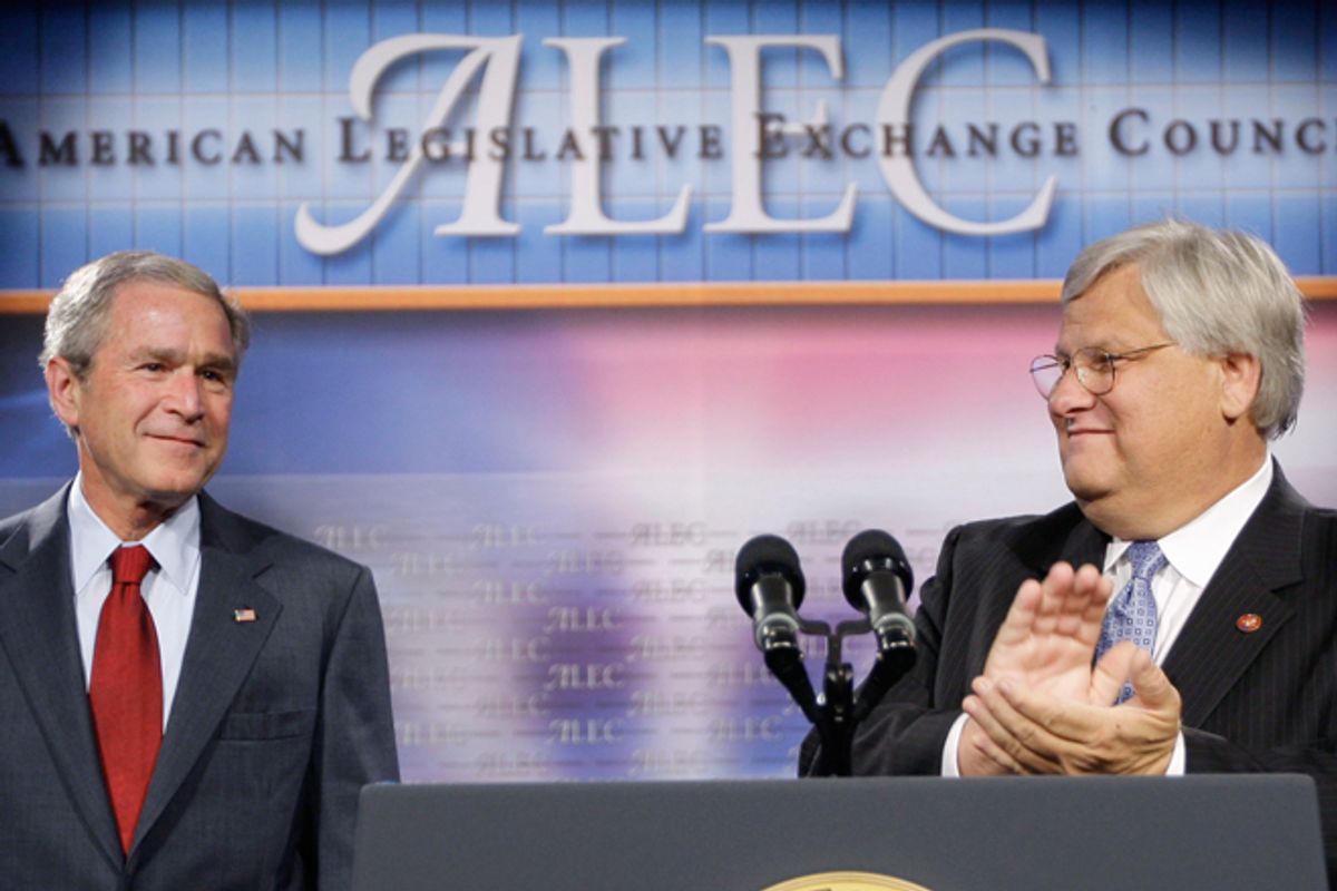 President George W. Bush, left, is introduced by Rep. Kenny Marchant prior to speaking at the American Legislative Exchange Council in 2007.  (AP/Pablo Martinez Montsivais)