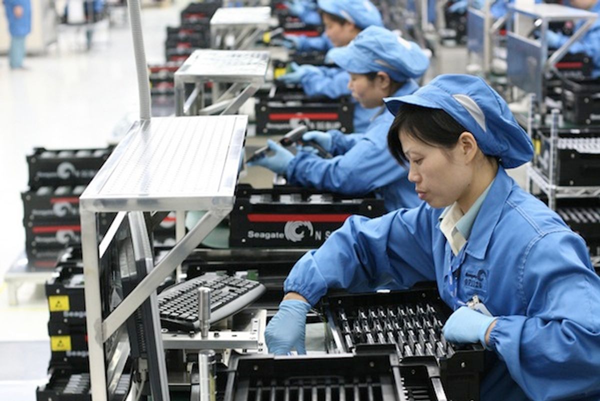 Workers at a Seagate Wuxi factory in China       (<span about='http://www.flickr.com/photos/scobleizer/3009516045/' xmlns:cc='http://creativecommons.org/ns#'><a href='http://www.flickr.com/photos/scobleizer/' rel='cc:attributionURL' target='_blank'>Robert Scoble</a> / <a href=http://creativecommons.org/licenses/by/2.0' rel='license' target='_blank'>CC BY 2.0</a></span>)